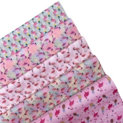 China Abrasion-Resistant Fine Glitter Printing Swan Fabric For Making Bags Bows for sale