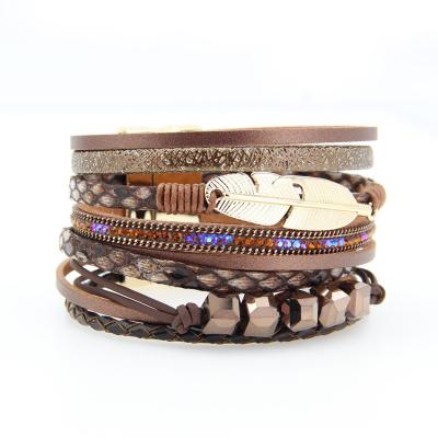 China Hot Sale BOHEMIA Multilayer Handmade Magnetic Charm Clasp Braided Bohemian Feather Leather Woven Beaded Bracelet for sale