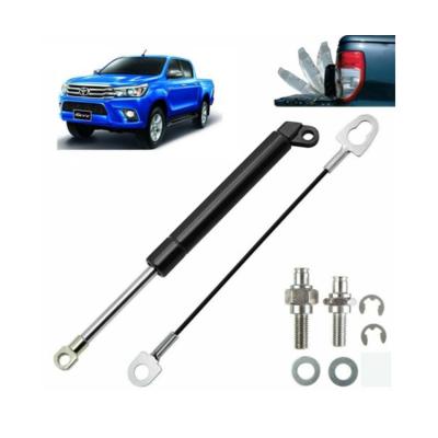 China Rear Gas Struts Shock Absorber Kit For Toyota Hilux Revo Pickup Slowdown Rear Shock Tailgate Support Shock for sale