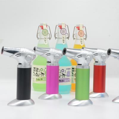 China Antorcha de butano Chef de cinco colores Parrilla recargable Encendedor Cocina Hornear Ajustable en venta