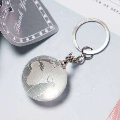 China Creative Gift Glass Key Pendant Crystal Earth Sports Souvenir Key Chain for sale