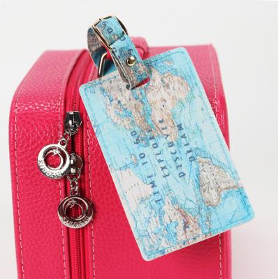 China Custom Luggage Sublimation Printed Soft PU Leather Luggage Tags With World Map For Travel for sale