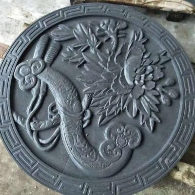 China Rustic Plant Natural Stone Relief Flower Black Sandstone Carving Pattern Design And Production for sale