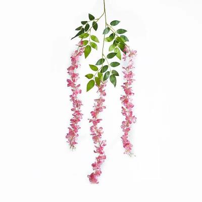 China 2020 New Design Eco-friendly Wholesale Artificial Wisteria Flower Wedding Decor Wall Hanging Plastic Silk Flower Wall for sale