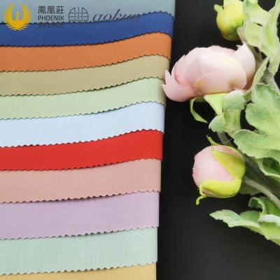 China Top Dyed Phoenix Village Polyester Rayon Spandex Woven Stretch Fabric High Quality Viscous Fabric For Suit And Pant for sale