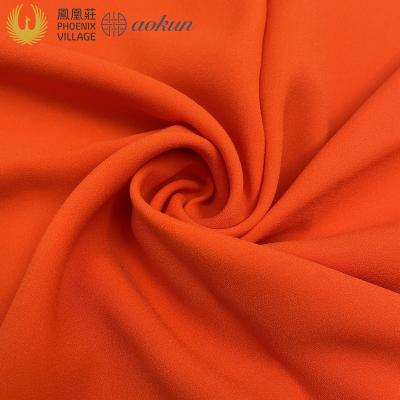 China Hot Sale Phoenix Village Shrink-Resistant Polyester Fabric Bi-stretch For Women Suit And Pants Woven Plain Dyed for sale