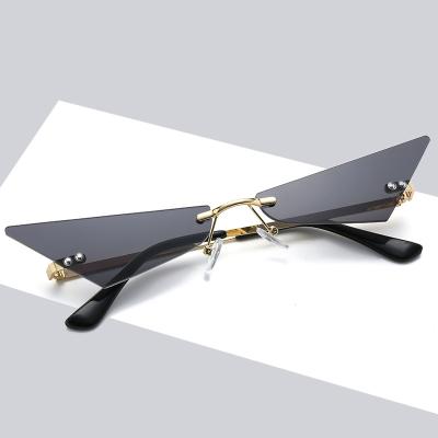 China Fashion Sunglasses 2021 2022 New Metal Metal Dcoptical Triangle Rimless Cat Eye Trendy Sunglasses For Women Female for sale