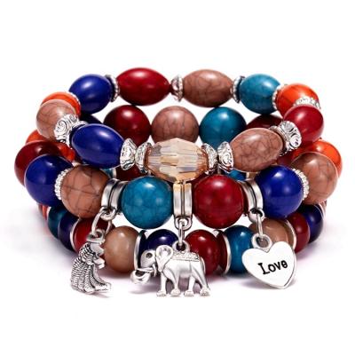 China Environmentally Fashion Vintage Charm Elephant Heart Friendly Wing Pendant Colorful Acrylic Resin Beads Women Ladies Boho Bracelet Set Multilayer Jewelry for sale