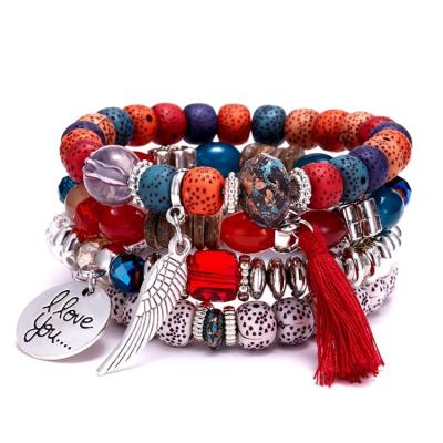 China Wholesale Environmentally Friendly Vintage Style Charm Wing Pendant Colorful Acrylic Bodhi Tassel Beads Women Boho Ladies Bracelet Set for sale