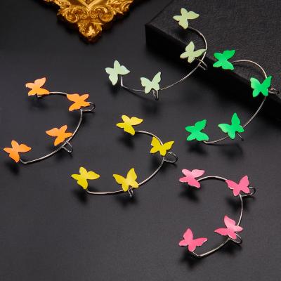 China Environmentally Friendly Elegant Female Gift Glowing In Dark Colorful Luminous Women No Piercing Butterfly Ear Clips Cuffs Earrings Jewelry for sale