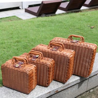 China Waterproof Vintage Woven Picnic Basket Storage Plastic Rattan Rectangular Woven Suitcase Soft Stackable Suitcase With Lid for sale