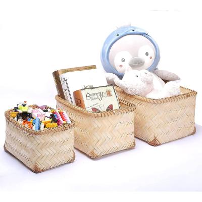 China Sustainable Woven Bamboo Basket Flat Roll Roll Wedding Favor Storage Bamboo Basket With Handle for sale