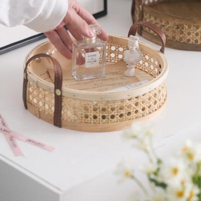 China Sustainable Natural Round Weave Rattan Serving Tray Eco - Friendly Home Decorative Trays With Handles for sale