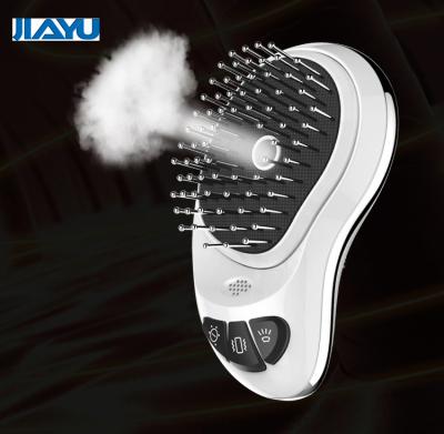 China Handy Rechargeable Battery Operated Mist Jet Massager Vibration Massage Steamer Brush for sale