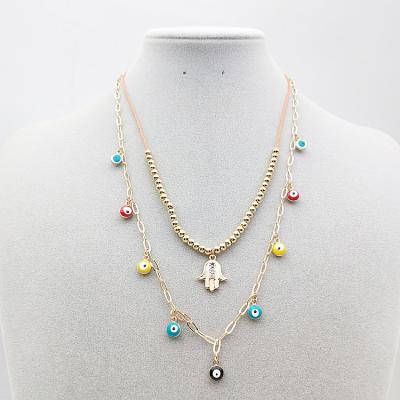 China FASHIONABLE Manufacturers Supply Multilayer Devil's Eye Palm Pendant Diamond Jewelry Necklace for sale