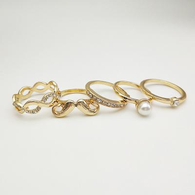 China TRENDY Direct Selling 5 Piece Set Custom Couple Rings Jewelry Women Diamond Combination Multi Style Ring for sale