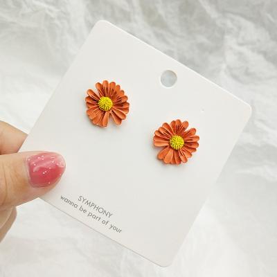 China FASHIONABLE Quality Spray Paint Color Small Daisy Floral Statement Earrings Women Stud Earrings for sale