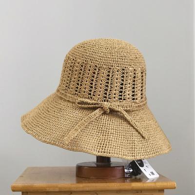 China Handmade Hollow Crochet Sunscreen Women Sunscreen Beach Folding Fisherman Hat Straw Braid Hat for Summer for sale