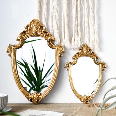 China Vintage Vintage Gold Home Decor Embossed Decorative Mirror Bathroom Makeup Wall Hanging Mirrors for sale