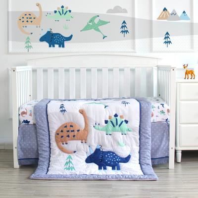 China Sustainable Blue Dinosaur Design Baby Set 3 Piece 100% Cotton Organic Print Crib Bedding Set for sale