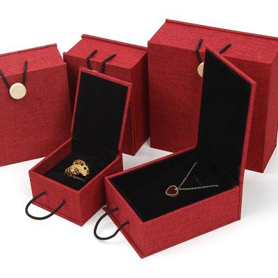 China Trendy Retro Fashion And Sophistication Canvas Velvet Material Boxes For Jewelry Packaging for sale