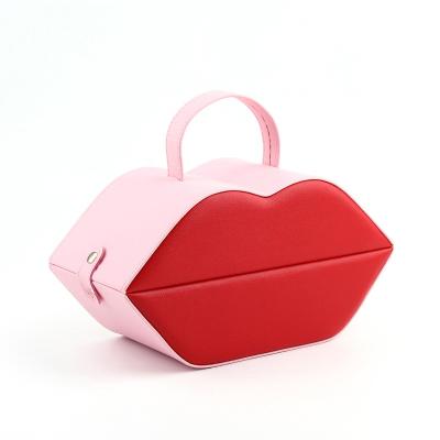 China Fashionable Unique Red Lips Design PU Packaging Ring Bracelet Snap Mirror Jewelry Storage Box With Handle for sale