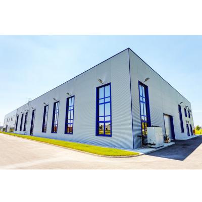 Chine Q345b bâtiments à cadre de portail hangar en acier entrepôt commercial préfabriqué à vendre