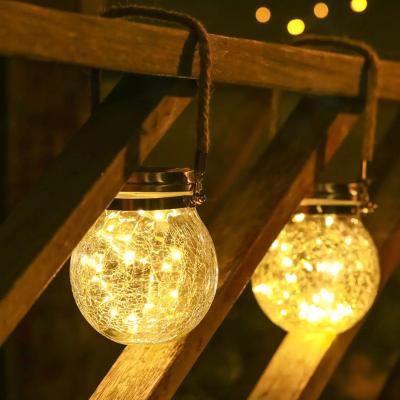 China 2021 Eco-friendly Outdoor Waterproof Landscape Lantern Lighting Solar Powered Garden Led Cracked Glass Hanging Light for sale