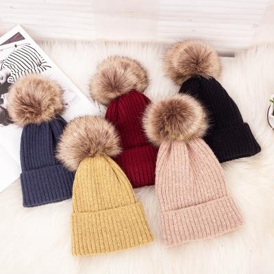 China 2022 Hot Unisex Knitted Hat Chunky Ribbed Acrylic Beanie Hat Fur Pom Pom Wholesale COMMON for sale