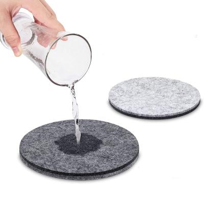 China Sustainable Whole Sale 2022 Custom Logo Durable Washable Wool Felt Fabric 8pcs Table Coasters Drink Coasters With Stand for sale