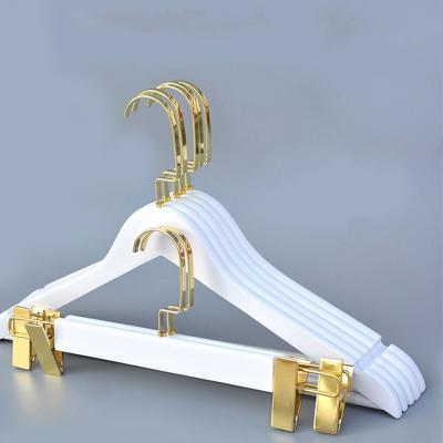 China Minimalist White Color Cloth Hanger Solid Wood Material Wooden Hangers for sale