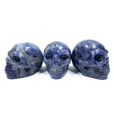 China China wholesale natural bluestone crystal hand - carved blue skulls healing crystal decorative craft for sale