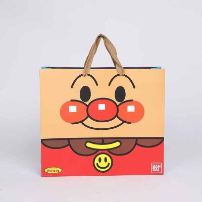 China Recycled Materials Custom Design Logo Printed Kraft Paper Shopping Bag For Small Commodity With Handle for sale