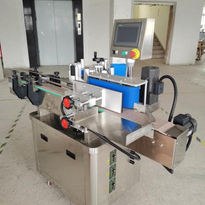 China Máquina de rotulagem automática para embalagens de alimentos à venda