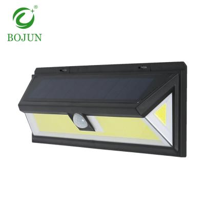 China 3 Modes Induction Garage ABS Waterproof Outdoor COB Ip65 20w Solar Led Wall Light for sale