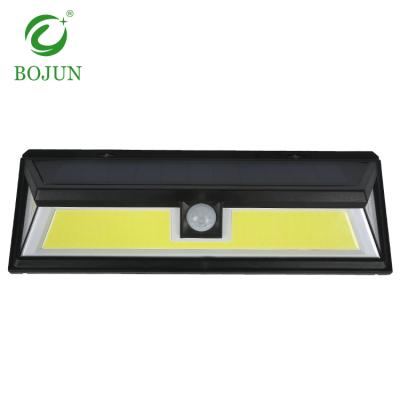 China 1 Year Warranty ABS Ip65 20watt Outdoor Lighting Waterproof Cob Garage Led Solar Wall Lighting for sale