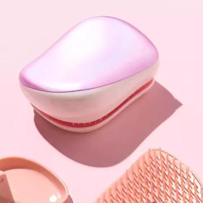 China Portable TT Comb Airbag Comb Massage Round Comb Travel Hair Brush Pocke Anti-knot TT Smooth Hair Comb t for sale