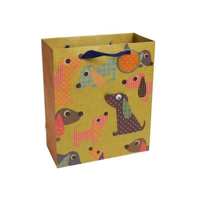 China New Design Safety Handmade Kraft Paper Shopping Bags , Cute Dogs Gift Bags With Logo for sale