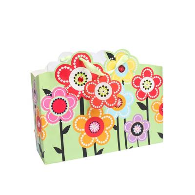 China Hot Selling High Quality Art Paper Shiny Glitter Bags, Colorful Flower Shopping Gift Security Bags for sale