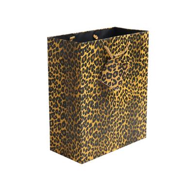 China Designs Art Shopping Bags Custom Made, Leopard Gift Security Fashion Paper Bags with Twist Rope Handle for sale