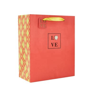 China Security Wholesale Red Heart Tie Paper Shopping Bag, Luxury Custom Printing Paper Gift Bag With Handle for sale