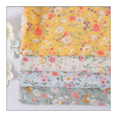 China Custom Made 100gsm 75D High Twist 100% Polyester Print Pearl Chiffon Fabric Shrink-Resistant For Shirts for sale