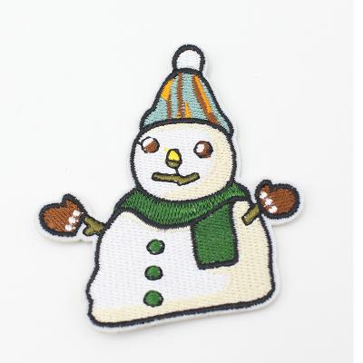 China Computer Viable Laser Cut Custom No Smudges Embroidered Cute Cartoon Christmas Patch With Blessing For Hat And Apparel for sale