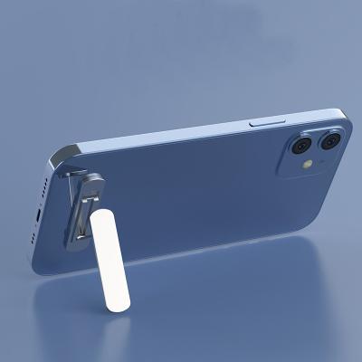 China Creative Invisible Foldable Metal Adjustable Multifunctional Easy Style Pocket Mobile Phone Stand Phone Holder for sale