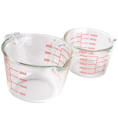 China Viable Clear Glass Measuring Cup With Graphics Red Household Mixing Measuring Cups for sale