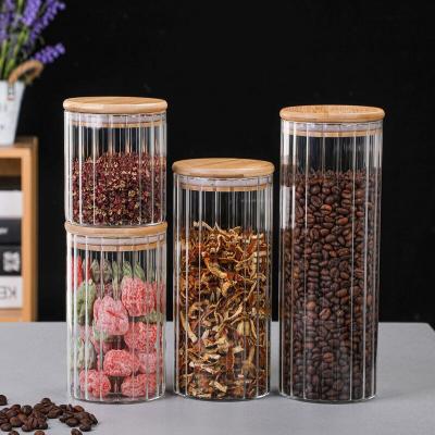 China Storage Heatable Striped Glass Jar With Lid Canister Bamboo Straight Kitchen Glass Jar for sale