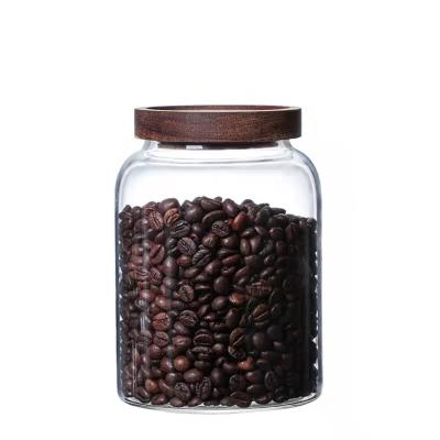 China Large Glass Storage Jars Tall Heatable Airtight Borosilicate Glass Jar With Lid for sale