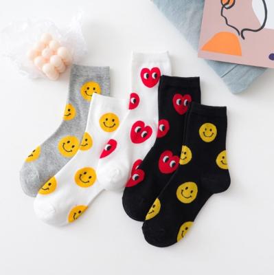 China Antibacterial Wholesale Women Heart Love Face Smile Trend Fancy Factory Cotton Breathable Socks for sale