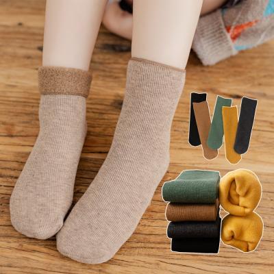 China Wholesale Winter Antibacterial Thick Fleece Kid Fluffy Warm Socks Fashion Solid Color Fuzzy Warm Kids Socks Comfortable for sale