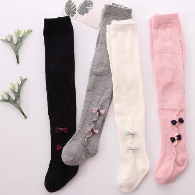 China QUICK DRY in new solid color bows baby pantyhose current korean cute cotton knitted fancy children pantyhose pantyhose for sale